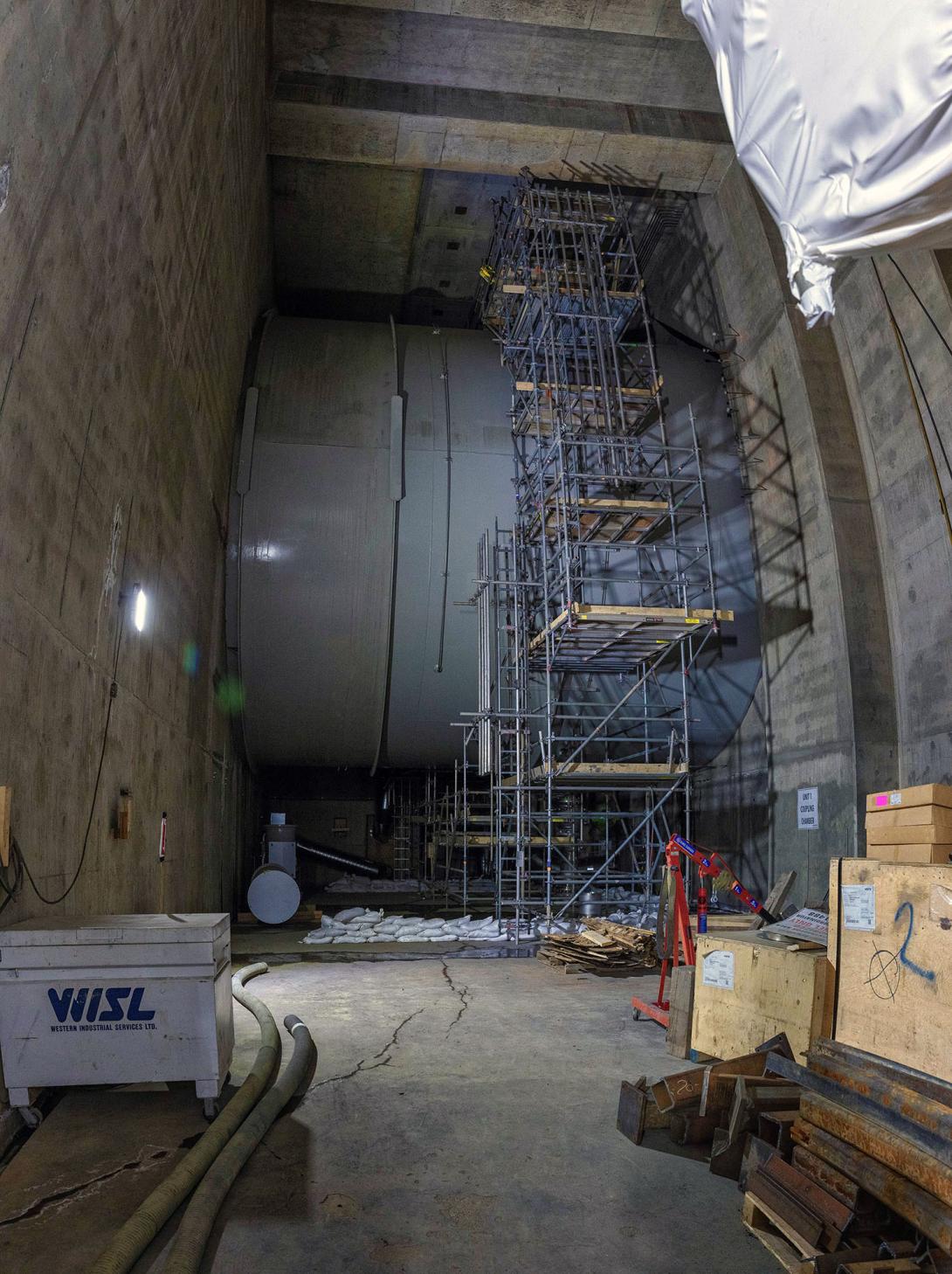 Side view of the flexible coupling that joins the upstream penstock to the downstream scroll case opening. Water flows through the coupling to turn the turbine runner and generate electricity. | March 2024