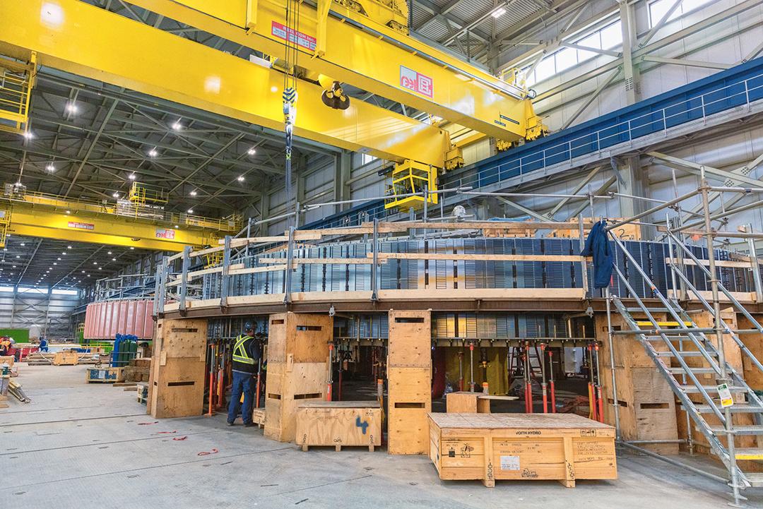 About 5,000 of these steel laminations form the rotor rim stacks. The rotor rim is part of the magnetic circuit between the moving rotor and the fixed stator. 