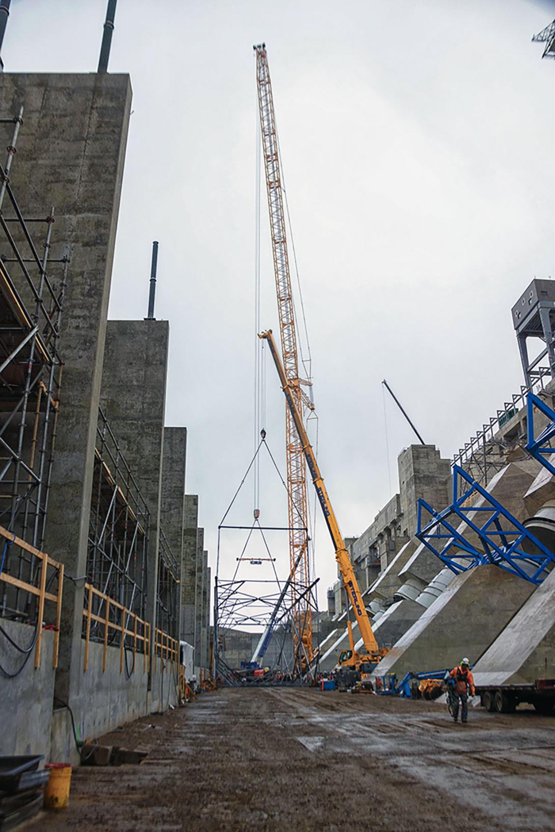 The transmission tower section is raised into the vertical position. 