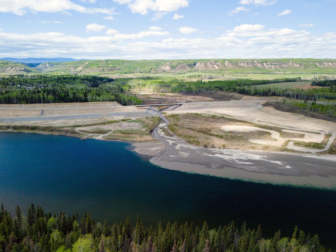 The Lynx Creek bridge stretches over Lynx Creek where it meets the Peace River. | May 2024