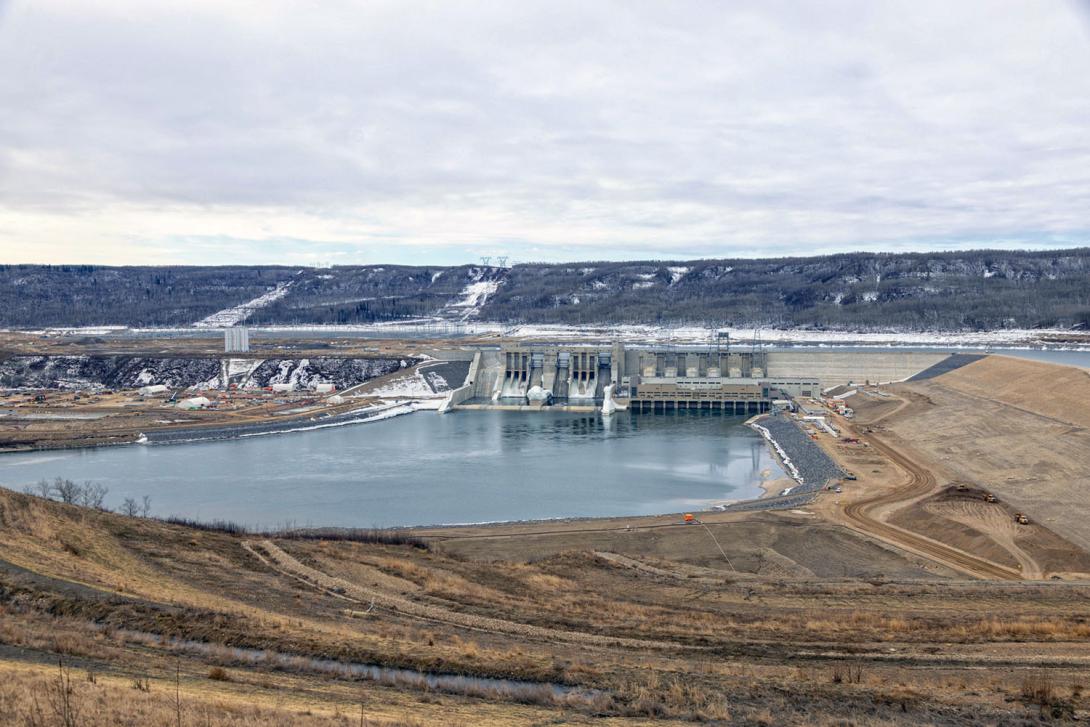 Facing the spillways and generating station, with the substation and transmission right-of-way in the background. | April 2025