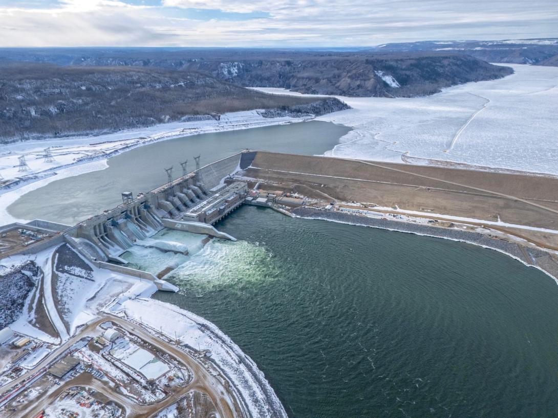 The Site C dam and generating station, with the approach channel left of centre. | March 2025