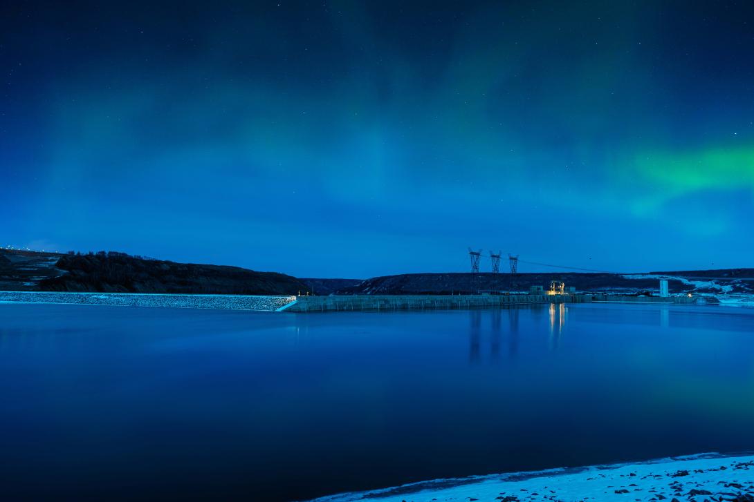 The approach channel at the Site C dam and generating station with Northern Lights overhead. | March 2025