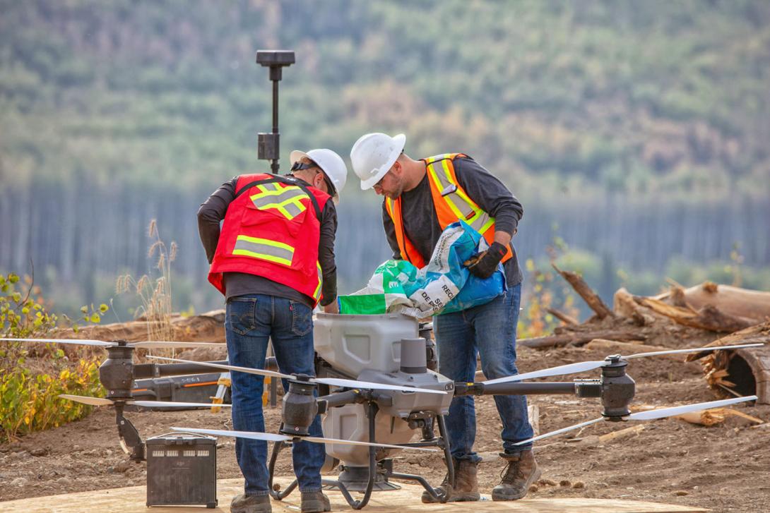 Native grass seed is poured into the hopper to prepare for seeding. | September 2025