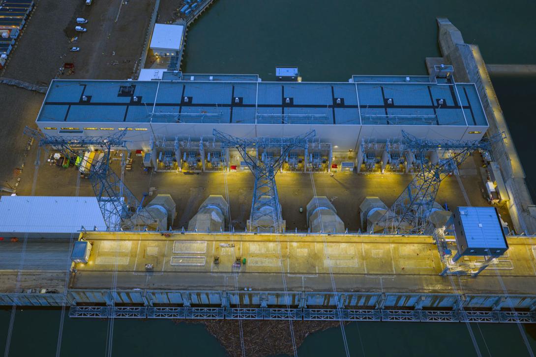 Aerial view of the Site C intake deck, penstocks, transformers, and powerhouse. | July 2025