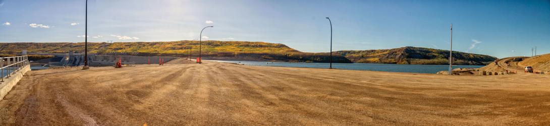 The dam crest viewed from the north bank facing south, is ready for paving. | September 2025