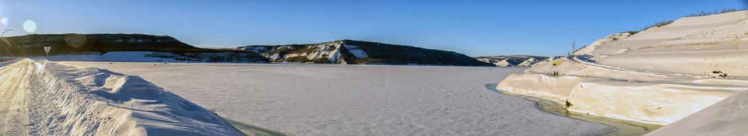 The Site C dam looking upstream across the reservoir toward the Moberly River. | January 2026